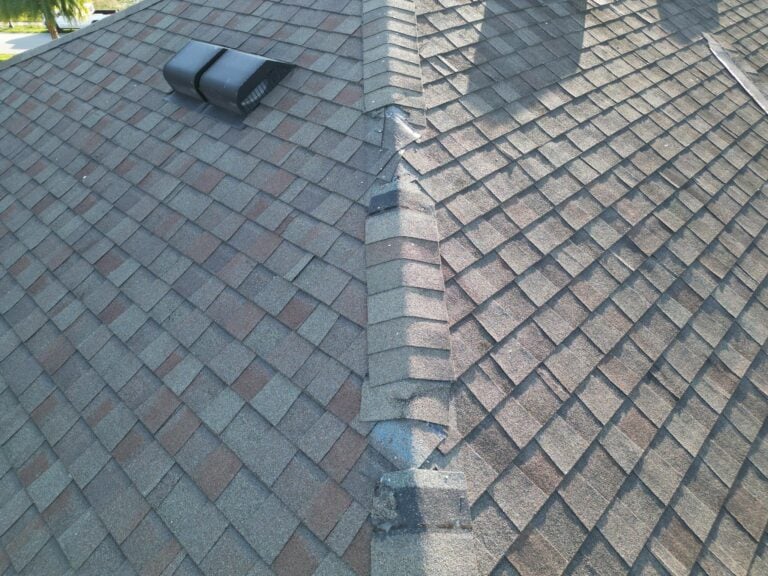 Missing shingles on a roof due to storm damage