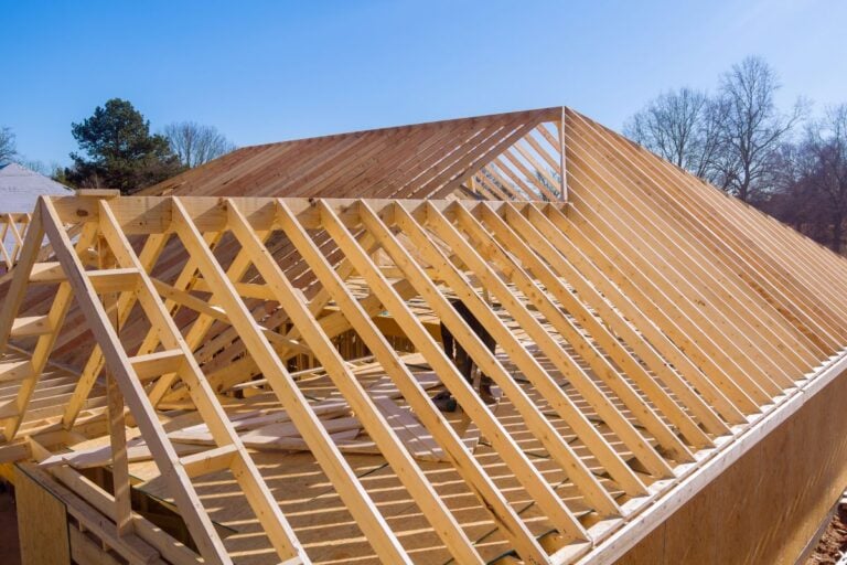 Wooden roof frames were constructed from trusses beams during construction of the new beam stick home