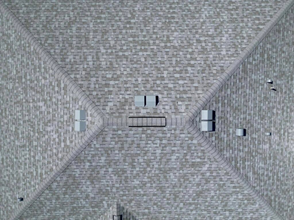Aerial view of a shingle roof with vents