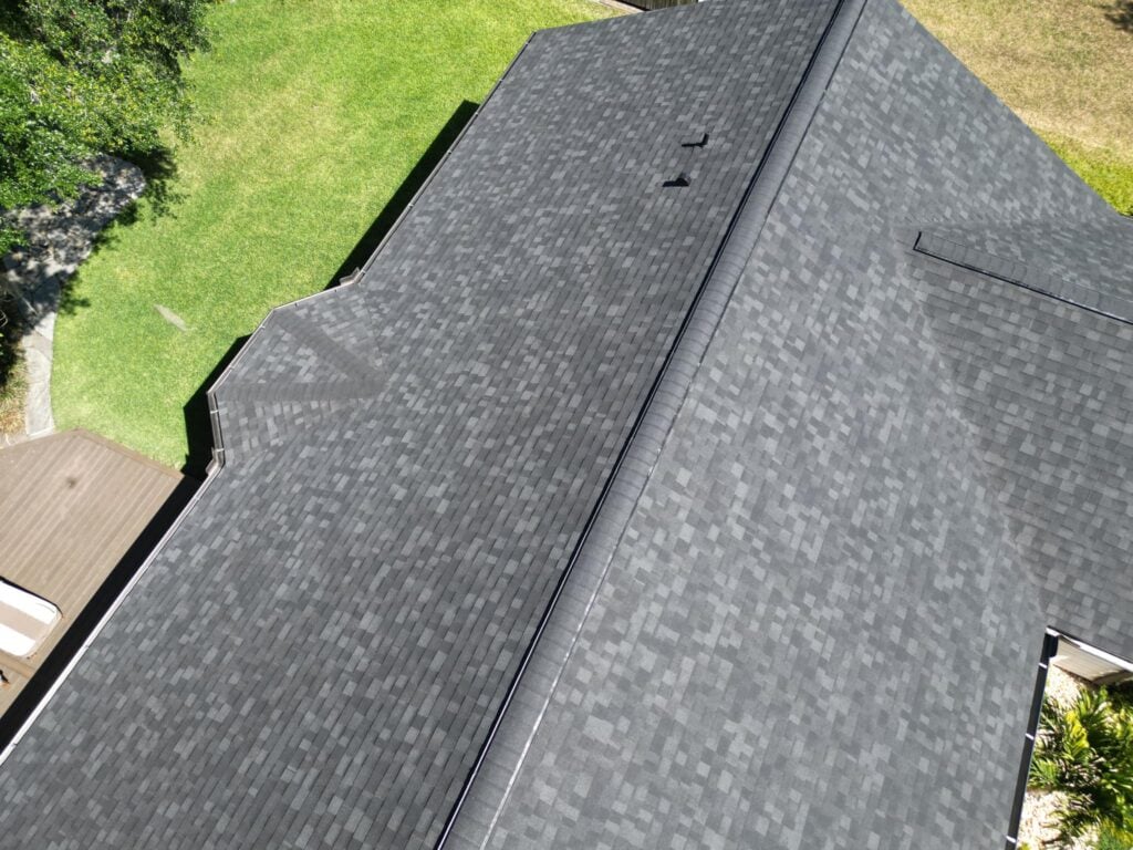 Aerial view of a grey shingle roof