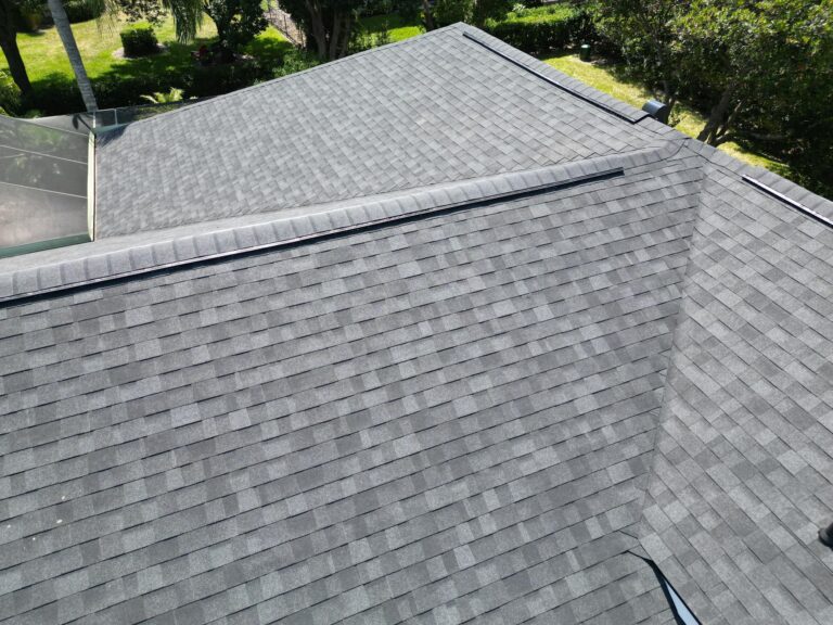 Grey shingle roof with vents