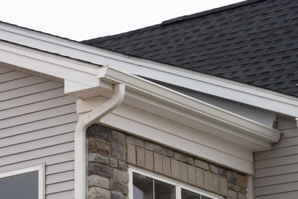 white plastic rain guttering system