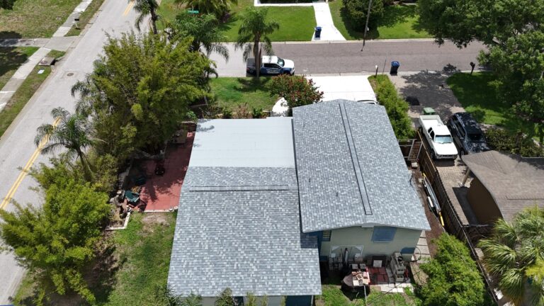 Aerial view of a grey asphalt shingles installed on florida roofing system